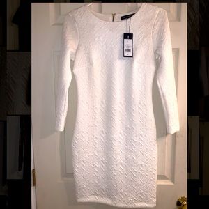 Sleek white bodycon fitting dress